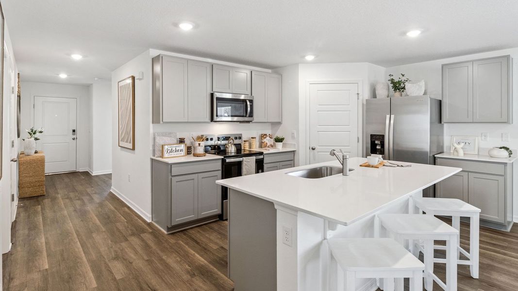Representative furnished interior of a home built from the Dundee by D.R. Horton in Leoma's Landing, Lake Wales (Image 12).