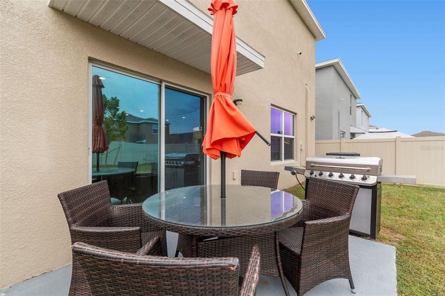 Exterior details and patio area of a home in Westgate at Avalon Park, Wesley Chapel (Image 3).