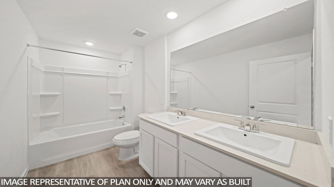 Furnished interior view inside a new home in Sunterra Lakes, Brookshire (Image 6).