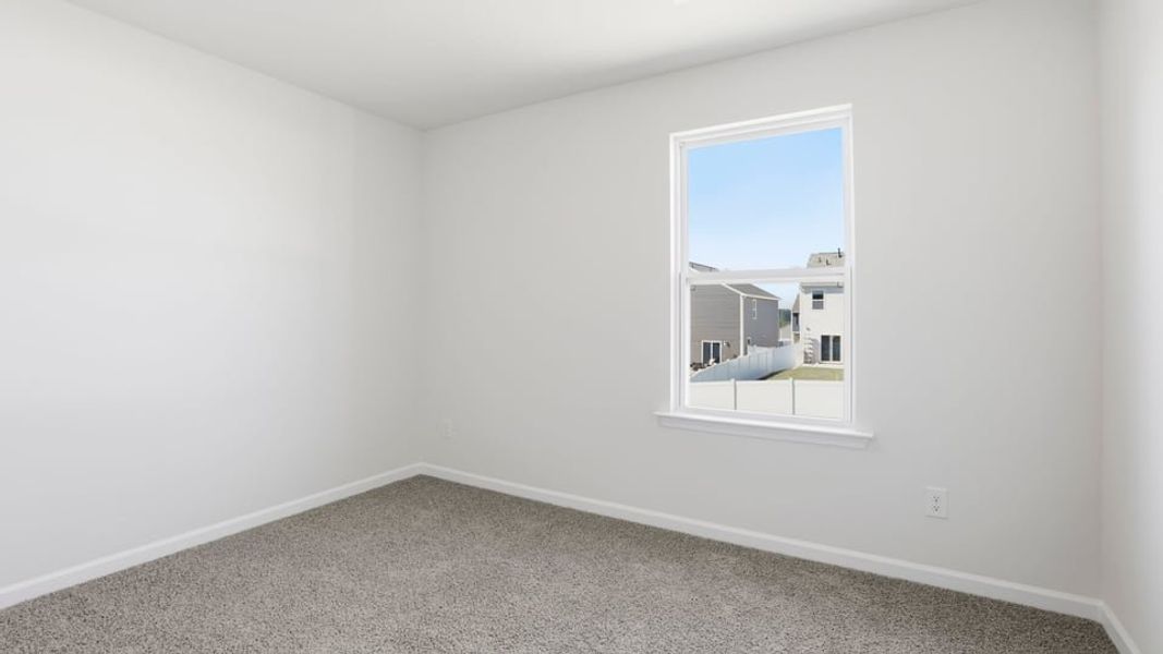 Spacious, unfurnished interior of a new home in Durbin Meadows Traditions, Fountain Inn (Image 29).