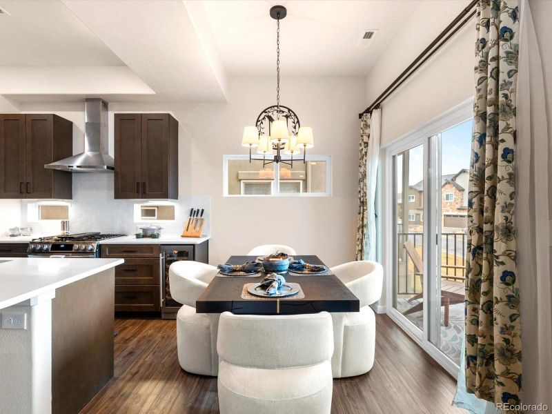 Dining area with access to the deck to watch nature right in your backyard. Dining area with access to the deck to watch nature right in your backyard.