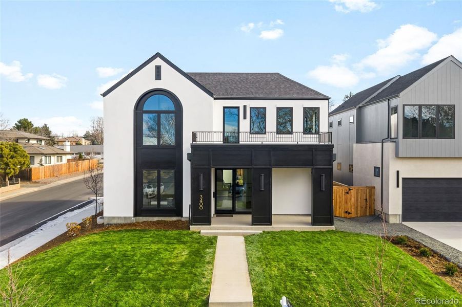 Front exterior of a new home in , Denver, CO, highlighting curb appeal (Image 24).