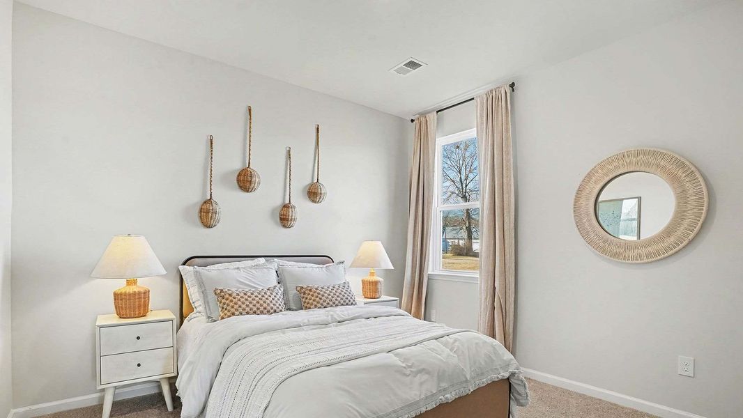 Representative furnished interior of a home built from the Aria by D.R. Horton in Meadow Walk, Loris (Image 9).