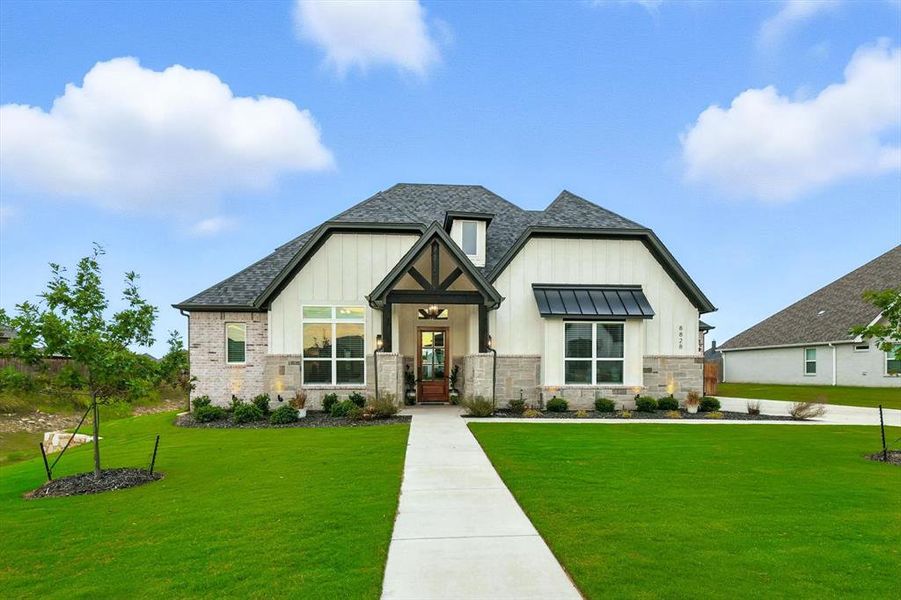 Front exterior of a new home in , Justin, TX, highlighting curb appeal (Image 22). Front exterior of a new home in , Justin, TX, highlighting curb appeal (Image 22).