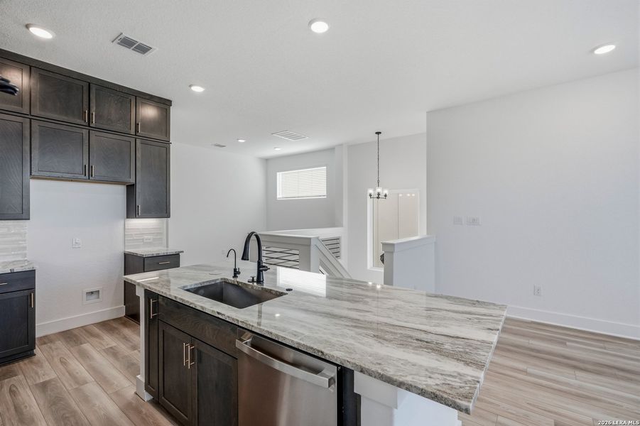 Furnished interior view inside a new home in Rose Hill, San Antonio (Image 7).