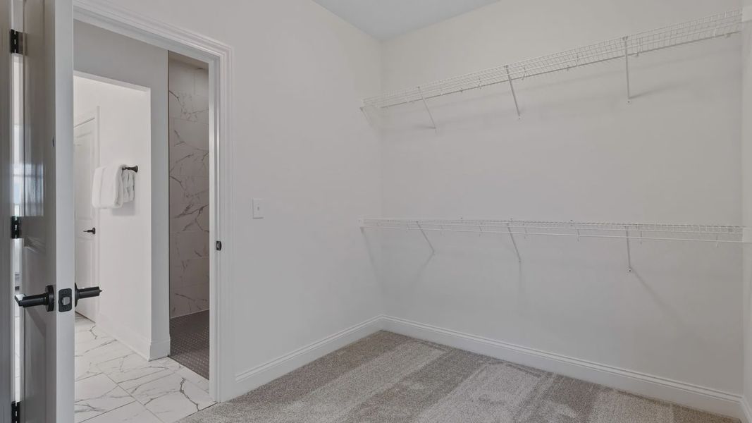 Representative unfurnished interior of a home built from the Salerno by Epcon Communities in Courtyards by Carrell, Ocean Isle Beach (Image 20).