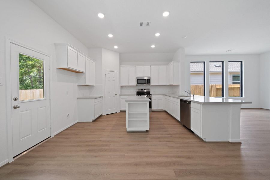 Furnished interior view inside a new home in Spring Creek Trails, Magnolia (Image 11).