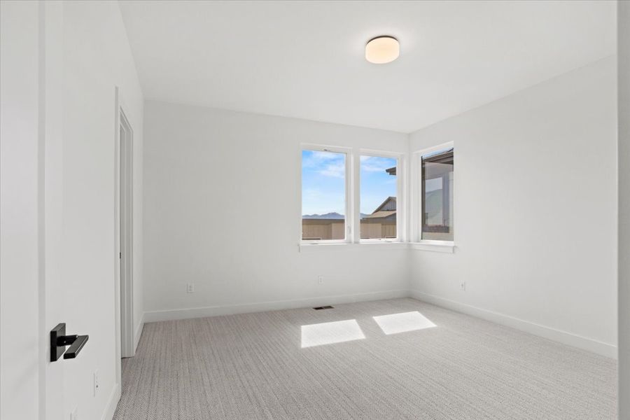 Spacious, unfurnished interior of a new home in West Grange, Longmont (Image 32).
