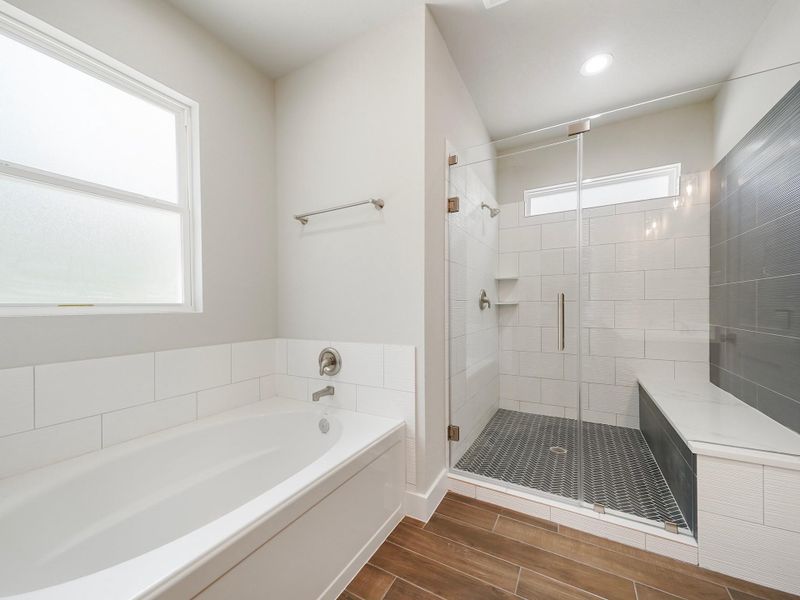 Bathroom is mix of navy blue and white cabinets Bathroom is mix of navy blue and white cabinets