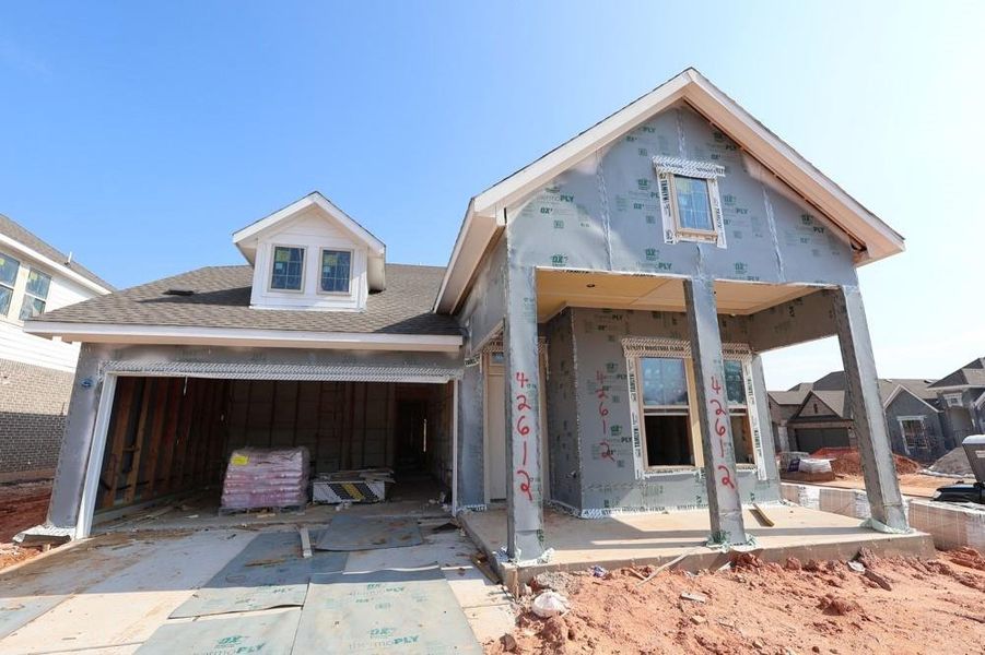 Front exterior of a new home in Escondido 45’ Homesites, Magnolia, TX, highlighting curb appeal (Image 2). Front exterior of a new home in Escondido 45’ Homesites, Magnolia, TX, highlighting curb appeal (Image 2).