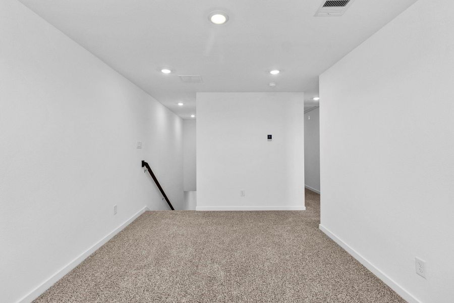 Spacious, unfurnished interior of a new home in Grand West, Houston (Image 21).