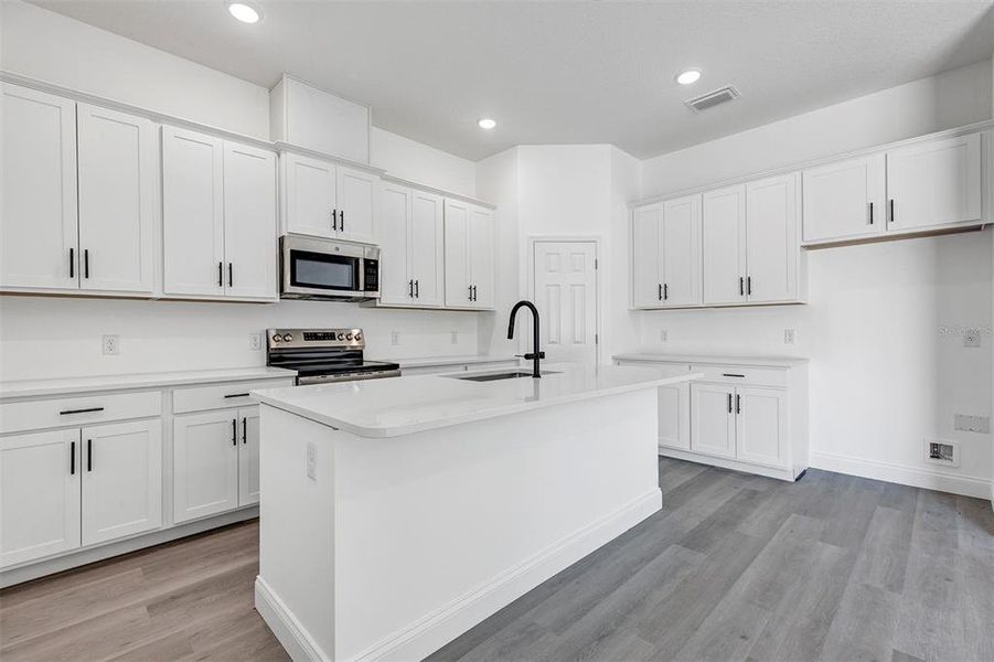 Furnished interior view inside a new home in , Deland (Image 7).