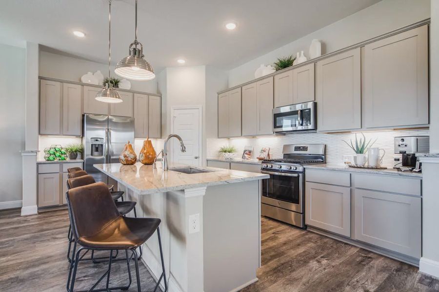 Representative furnished interior of a home built from the Carlisle by Chesmar Homes in Stillwater Ranch, Buda (Image 5).
