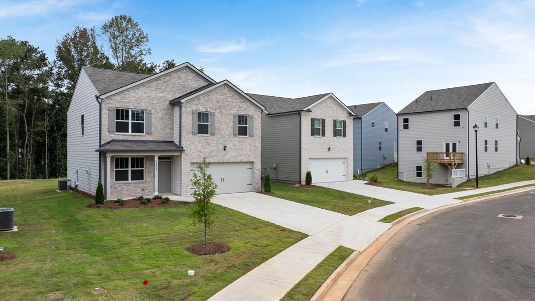 Representative exterior photo of a completed home built from the BELHAVEN by D.R. Horton in Pointe Park, Union City, GA (Image 22).