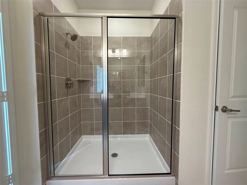 Furnished interior view inside a new home in River Bluff, Leander (Image 7).