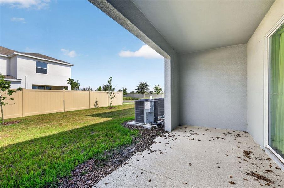 Exterior details and patio area of a home in Mangrove Point, Apollo Beach (Image 26).