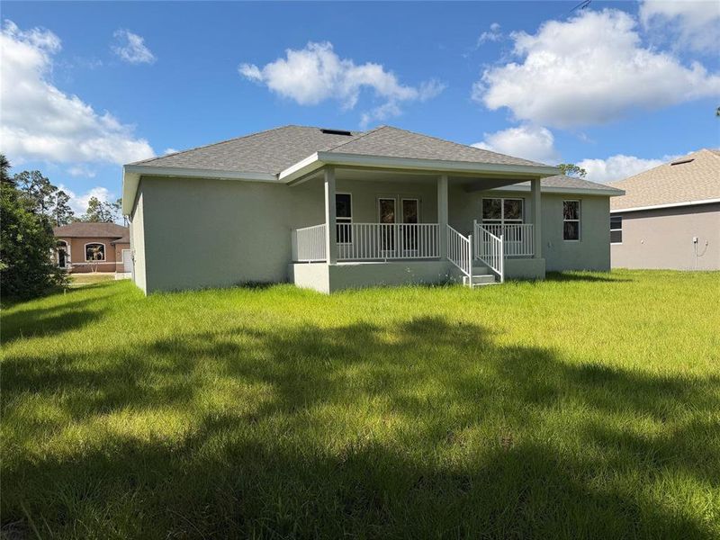 Exterior details and patio area of a home in Port Charlotte, Port Charlotte (Image 3).