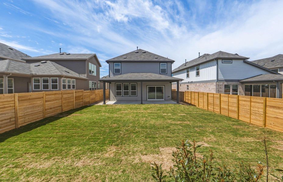 Exterior details and patio area of a home in Horizon Lake, Leander (Image 22).