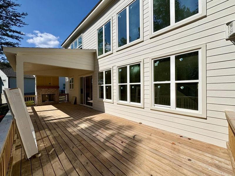Front exterior of a new home in Arden on Lanier, Cumming, GA, highlighting curb appeal (Image 16). Front exterior of a new home in Arden on Lanier, Cumming, GA, highlighting curb appeal (Image 16).