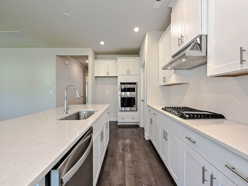 Enjoy your morning coffee at the kitchen island.