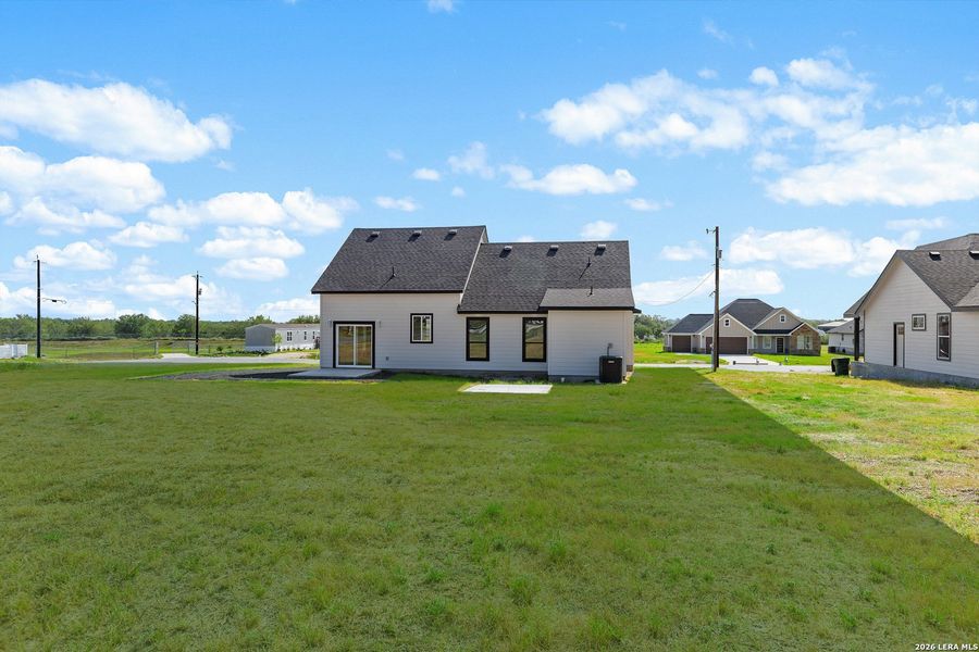 Exterior details and patio area of a home in , Atascosa (Image 27).