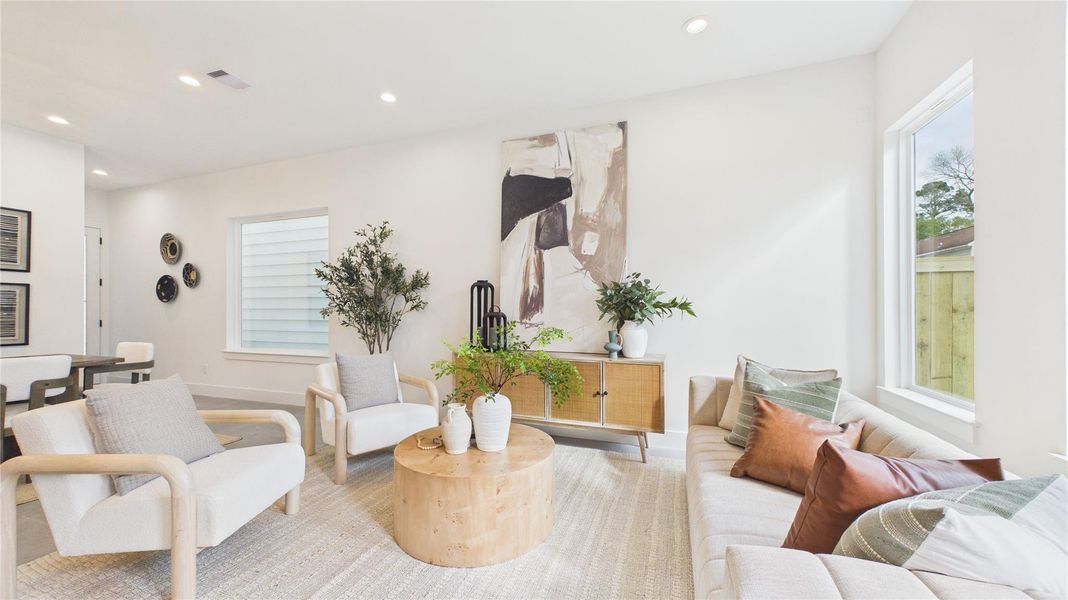 Enjoy lively debates, or intimate conversations with your favorite people in this airy living space!