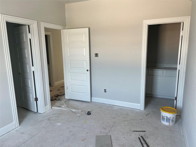 Unfurnished bedroom with baseboards