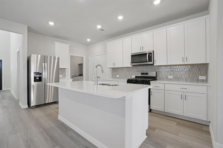 Furnished interior view inside a new home in Trails of Lavon - Spring Series, Lavon (Image 8).