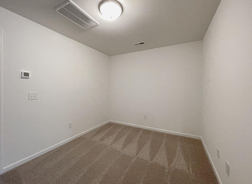 Spacious, unfurnished interior of a new home in East Main Townes, Spartanburg (Image 24).