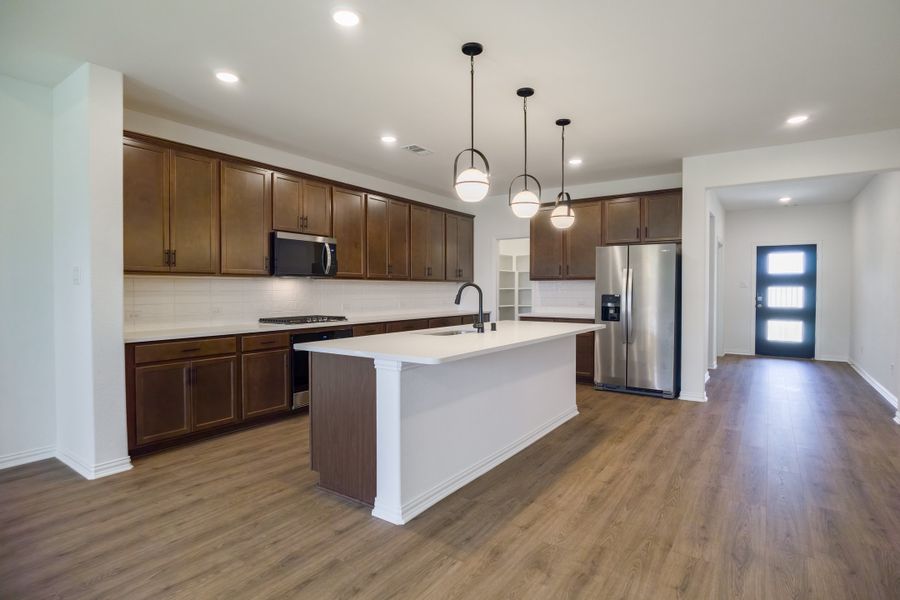 Furnished interior view inside a new home in The Villages of Hurricane Creek, Anna (Image 8).