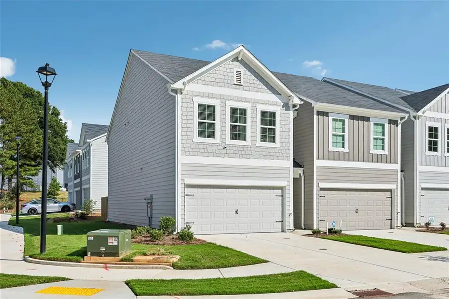 Front exterior of a new home in , Decatur, GA, highlighting curb appeal (Image 25).