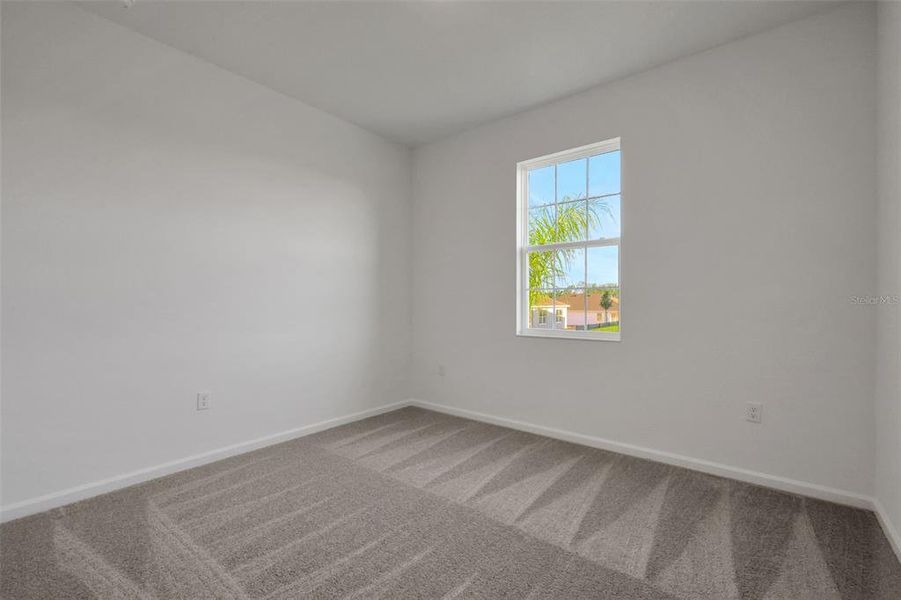 Spacious, unfurnished interior of a new home in Seaport Village, Tavares (Image 32).