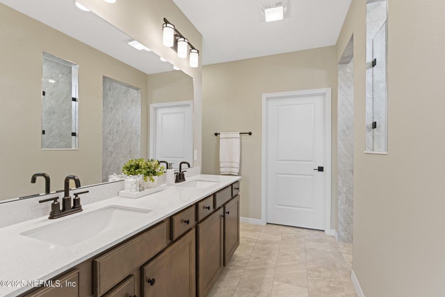 Furnished interior view inside a new home in Summer Bay at Grand Oaks, St. Augustine (Image 31).