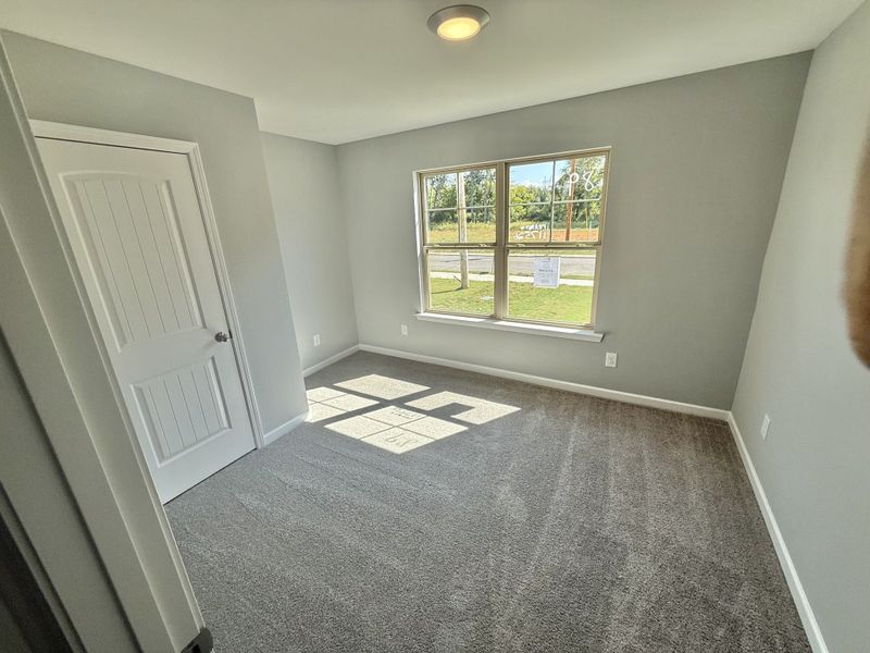 Spacious, unfurnished interior of a new home in Stonehenge, Manchester (Image 8).