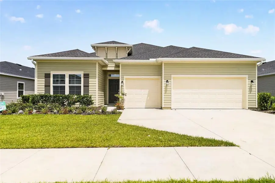 Front exterior of a new home in , Alachua, FL, highlighting curb appeal (Image 2). Front exterior of a new home in , Alachua, FL, highlighting curb appeal (Image 2).