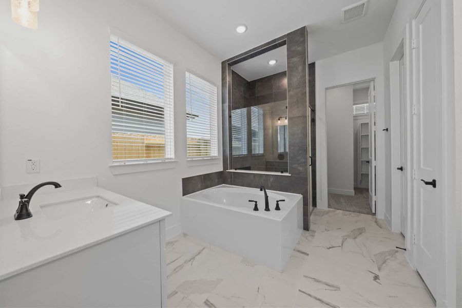 Representative furnished interior of a home built from the Augusta by Chesmar Homes in Riceland Alley Loads, Mont Belvieu (Image 5).