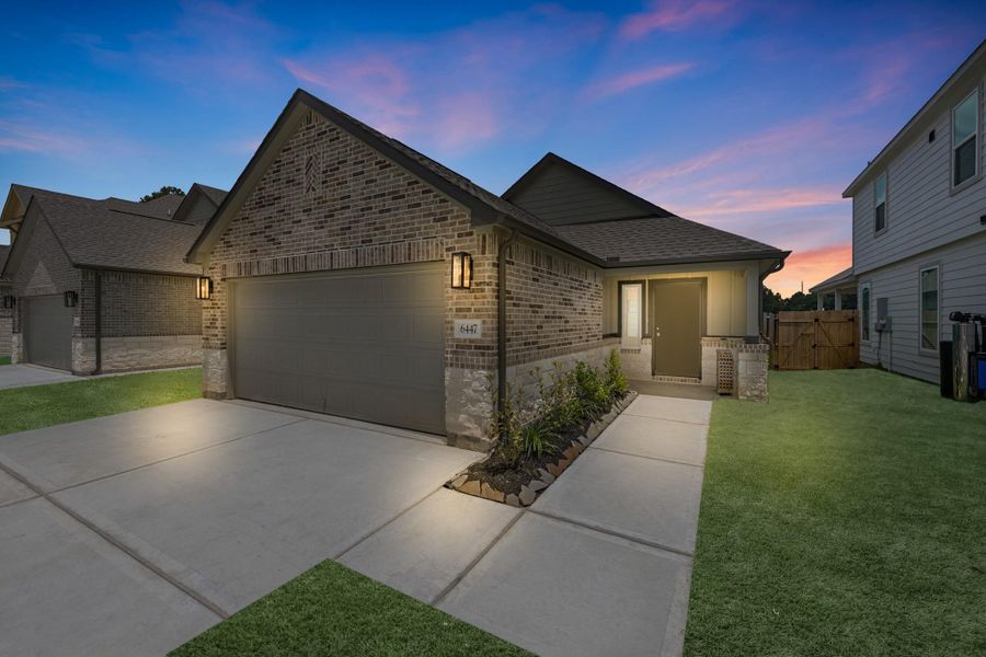 Front exterior of a new home in Cypresswood Landing, Humble, TX, highlighting curb appeal (Image 1). Front exterior of a new home in Cypresswood Landing, Humble, TX, highlighting curb appeal (Image 1).