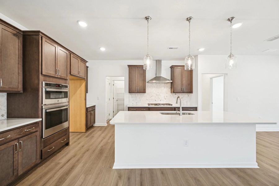 Kitchen featuring the AW Collection® Roosevelt - Bold finishes and refined design touches.