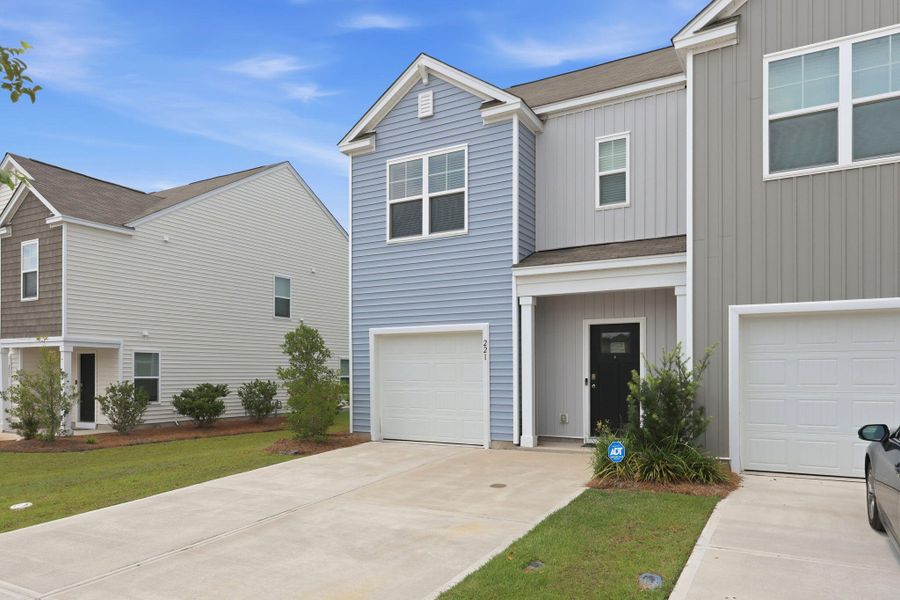 Front exterior of a new home in , Moncks Corner, SC, highlighting curb appeal (Image 25). Front exterior of a new home in , Moncks Corner, SC, highlighting curb appeal (Image 25).