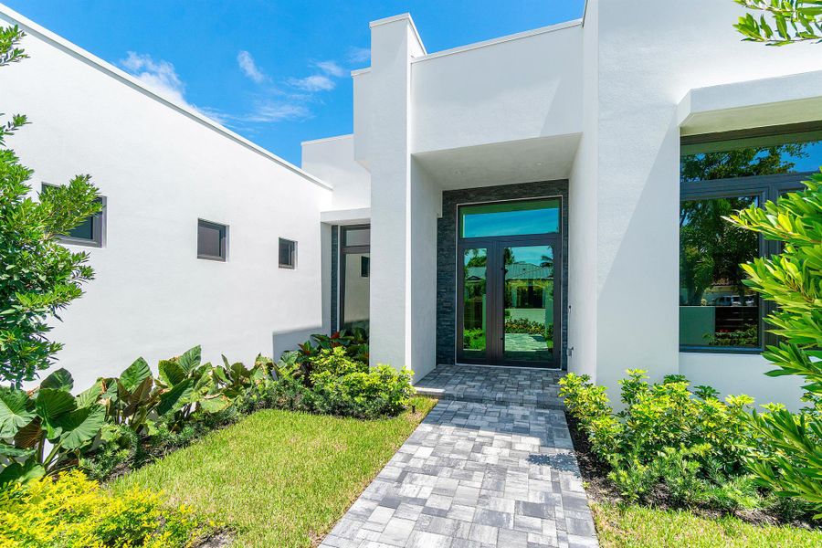 Front exterior of a new home in , Delray Beach, FL, highlighting curb appeal (Image 21).