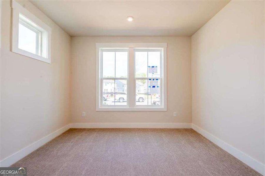 Spacious, unfurnished interior of a new home in The Paddocks at Doc Hughes, Buford (Image 27).