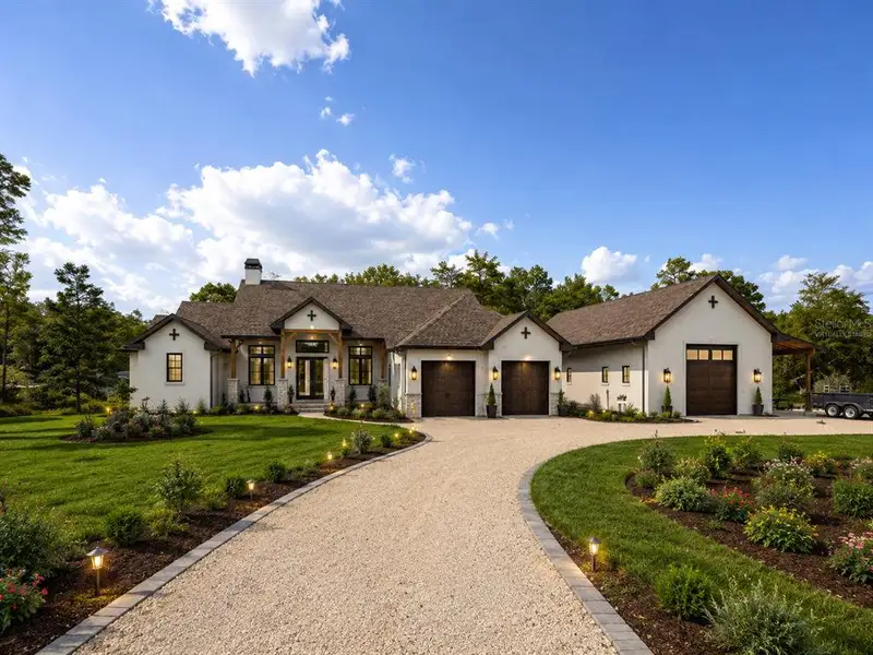 Front exterior of a new home in , New Port Richey, FL, highlighting curb appeal (Image 1). Front exterior of a new home in , New Port Richey, FL, highlighting curb appeal (Image 1).