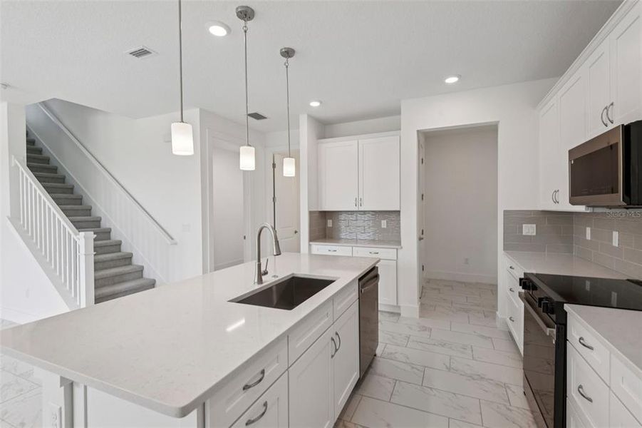 Furnished interior view inside a new home in Lagoon Residences at Epperson, Wesley Chapel (Image 7).
