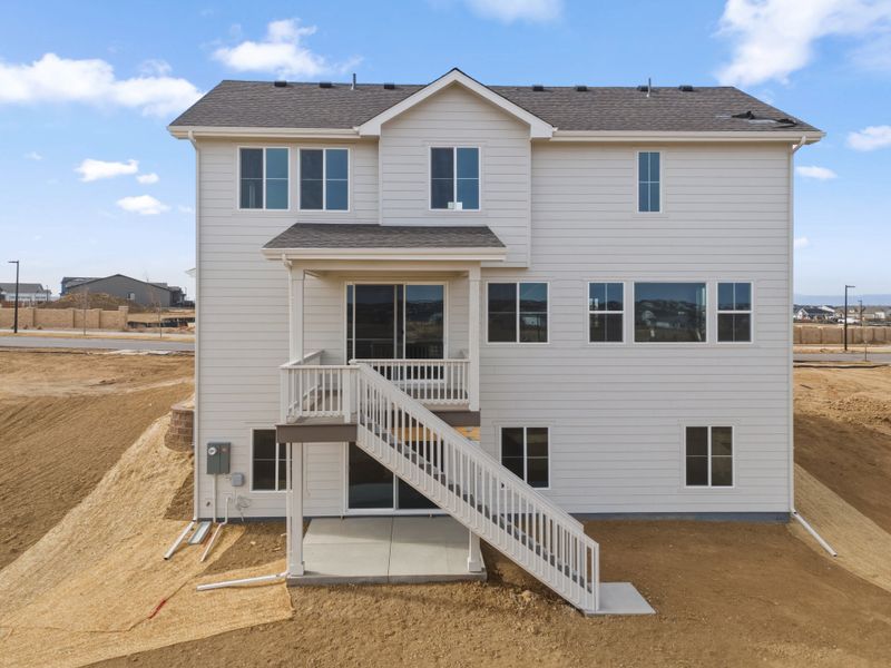Exterior details and patio area of a home in The Aurora Highlands, Aurora (Image 3).