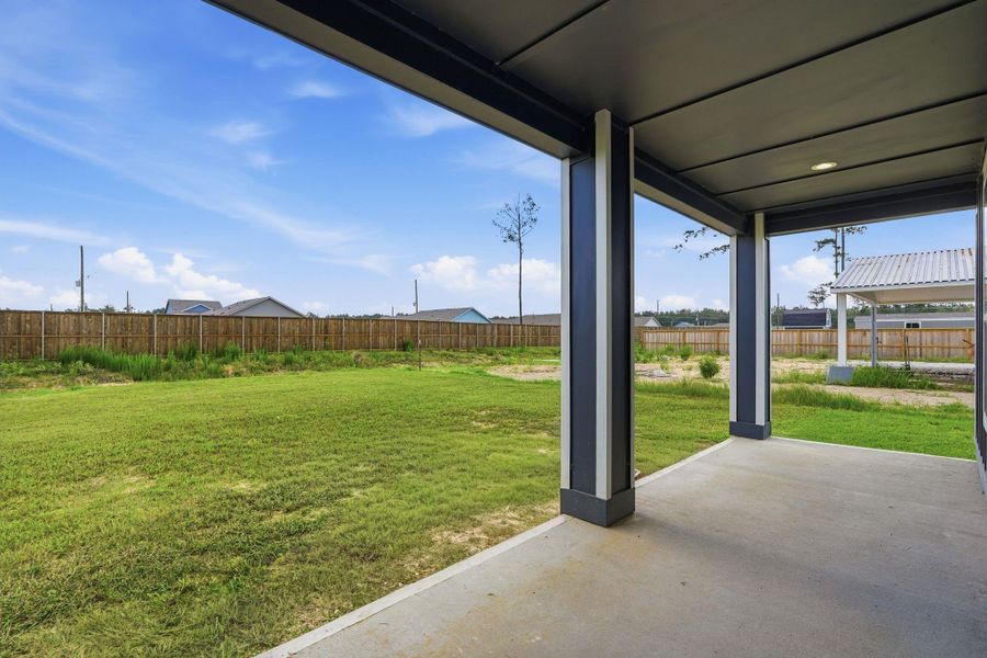 Exterior details and patio area of a home in , Conroe (Image 23).