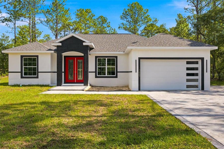 Front exterior of a new home in , Dunnellon, FL, highlighting curb appeal (Image 1). Front exterior of a new home in , Dunnellon, FL, highlighting curb appeal (Image 1).