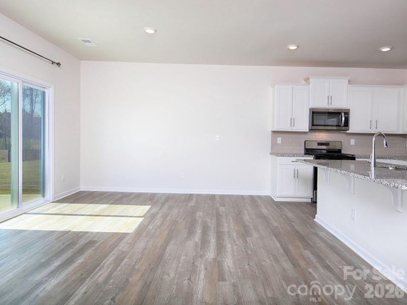 Spacious, unfurnished interior of a new home in Villas at Sherrills Ford, Terrell (Image 32).