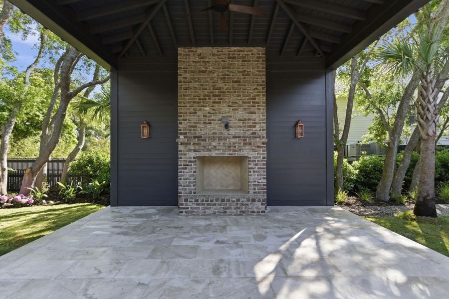 Exterior details and patio area of a home in , Sullivan's Island (Image 26).