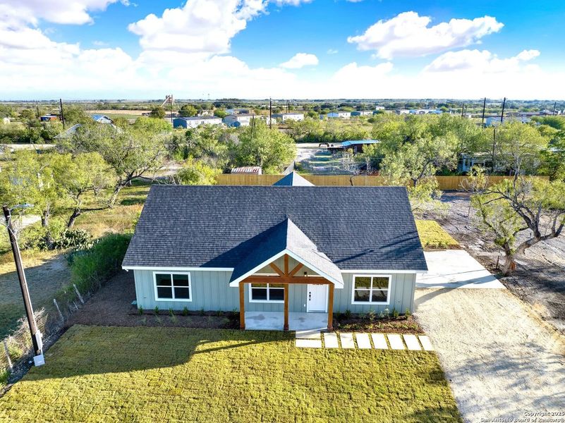 Front exterior of a new home in , Hondo, TX, highlighting curb appeal (Image 19).