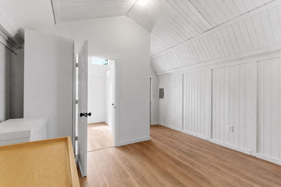 Vaulted ceilings, fresh interior paint and new flooring add value to this home. 1st bedroom right off the entry and next to the kitchen space.